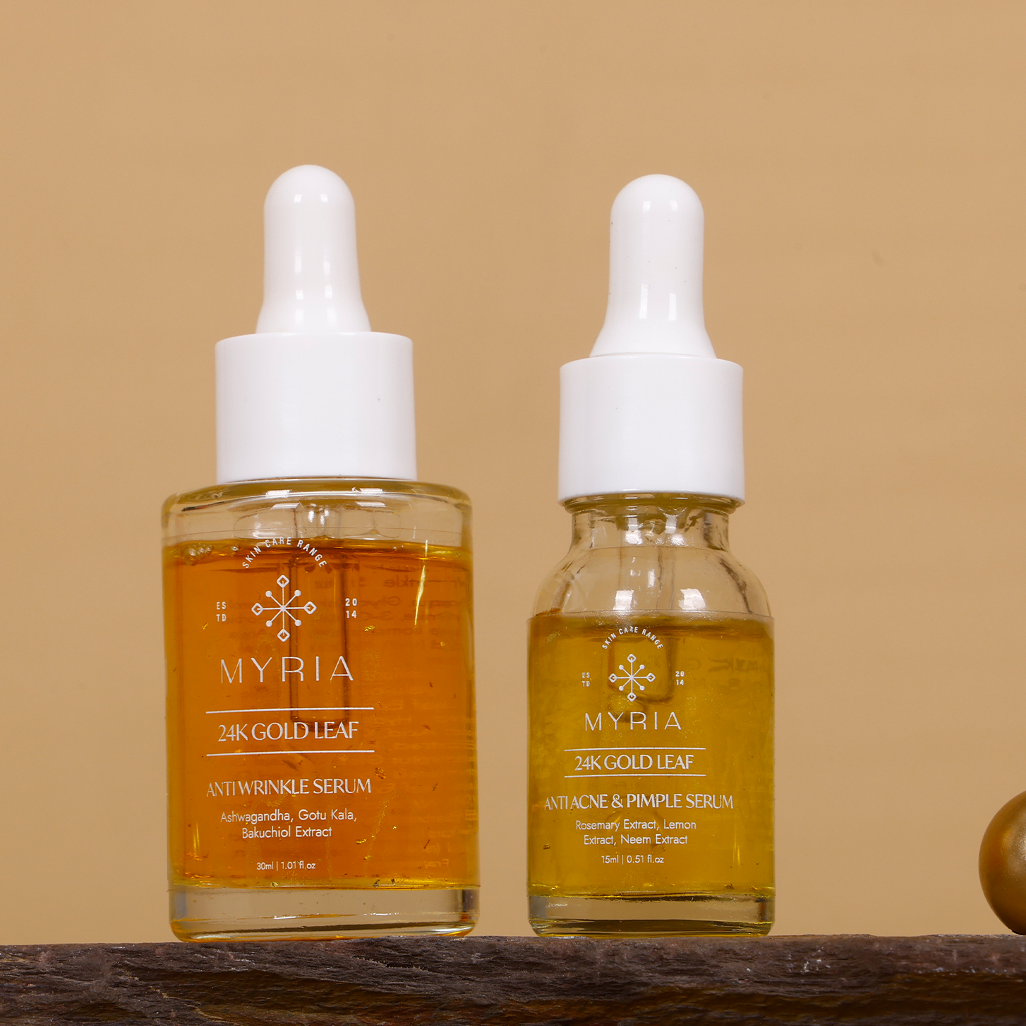 Myria 24K Pure Gold Leaf Anti Acne & Pimples Serum (15ml) + Myria 24K Pure Gold Leaf Anti Wrinkles Serum (30ml).